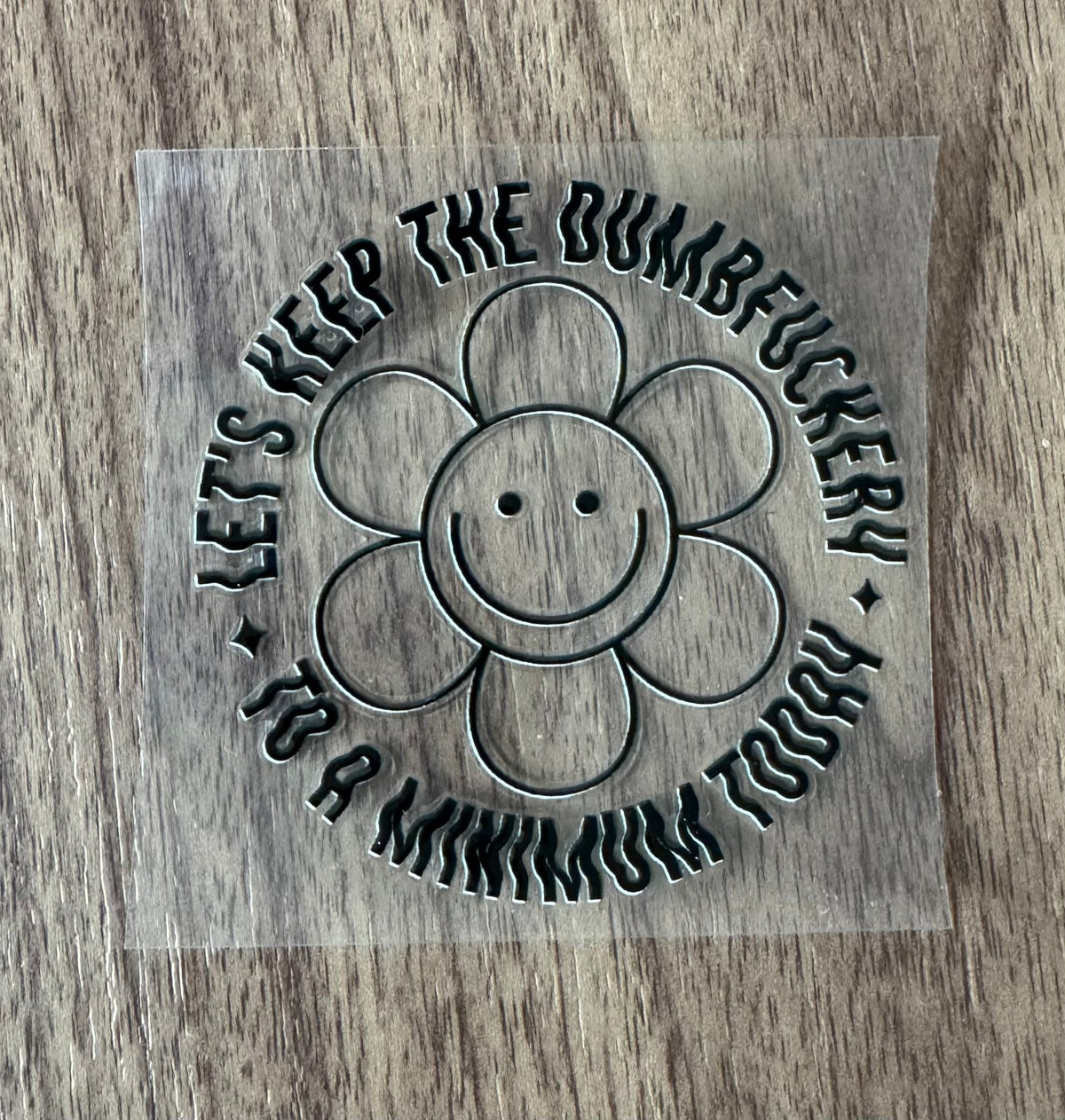 Dumbf-ery to a Minimum Circle Decal